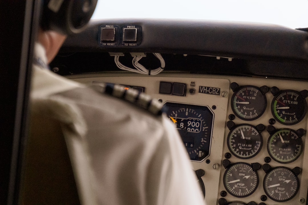Pilot in cockpit with instruments