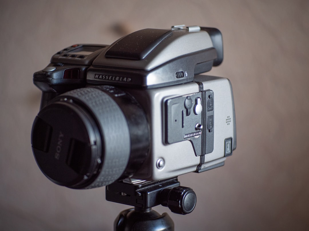 A drone flies over a lake.