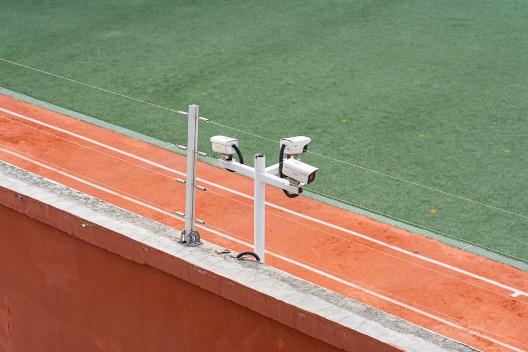 Security cameras are mounted on the building's wall.